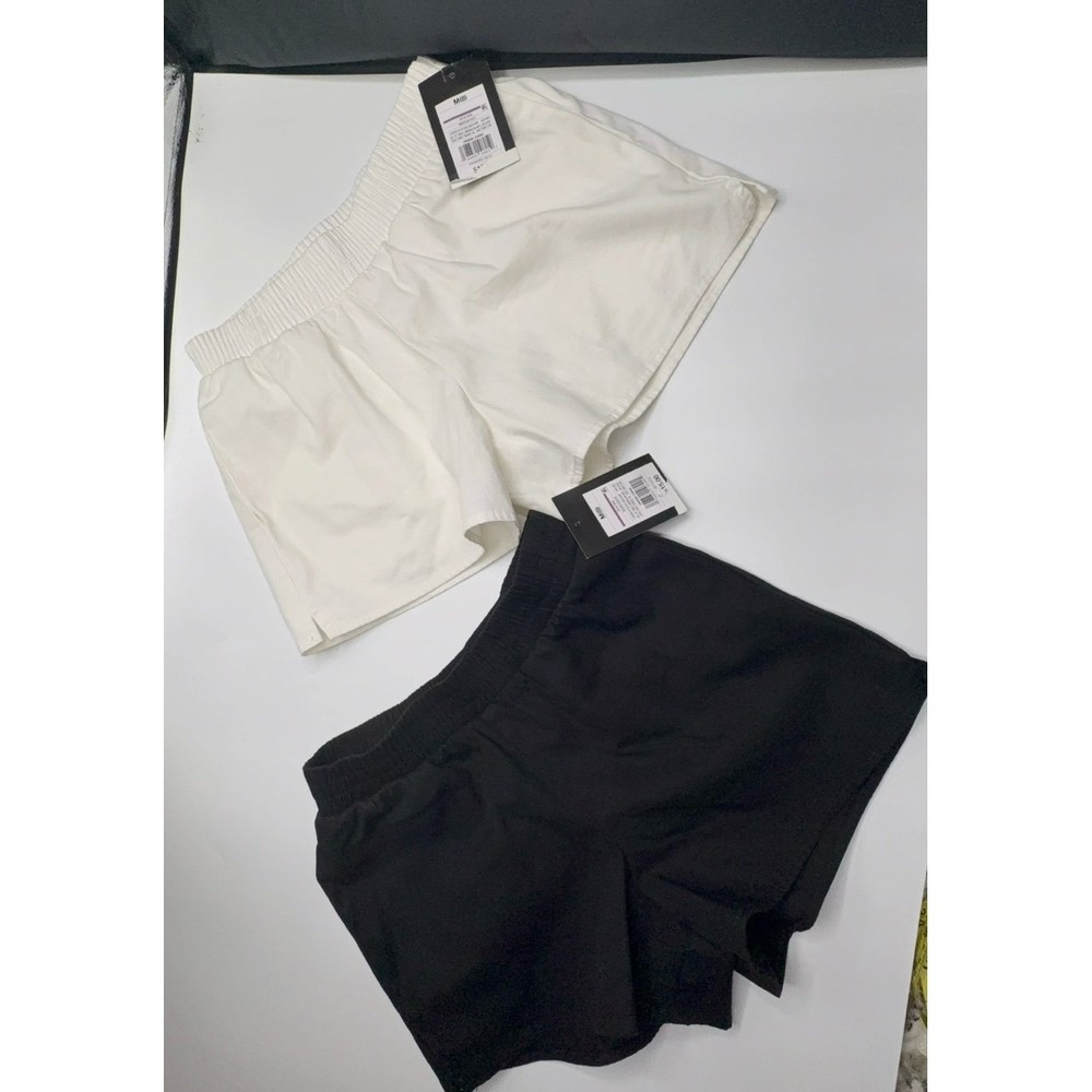 NEW two pairs of youth girls size medium (8) Art Class shorts.  Black & white.